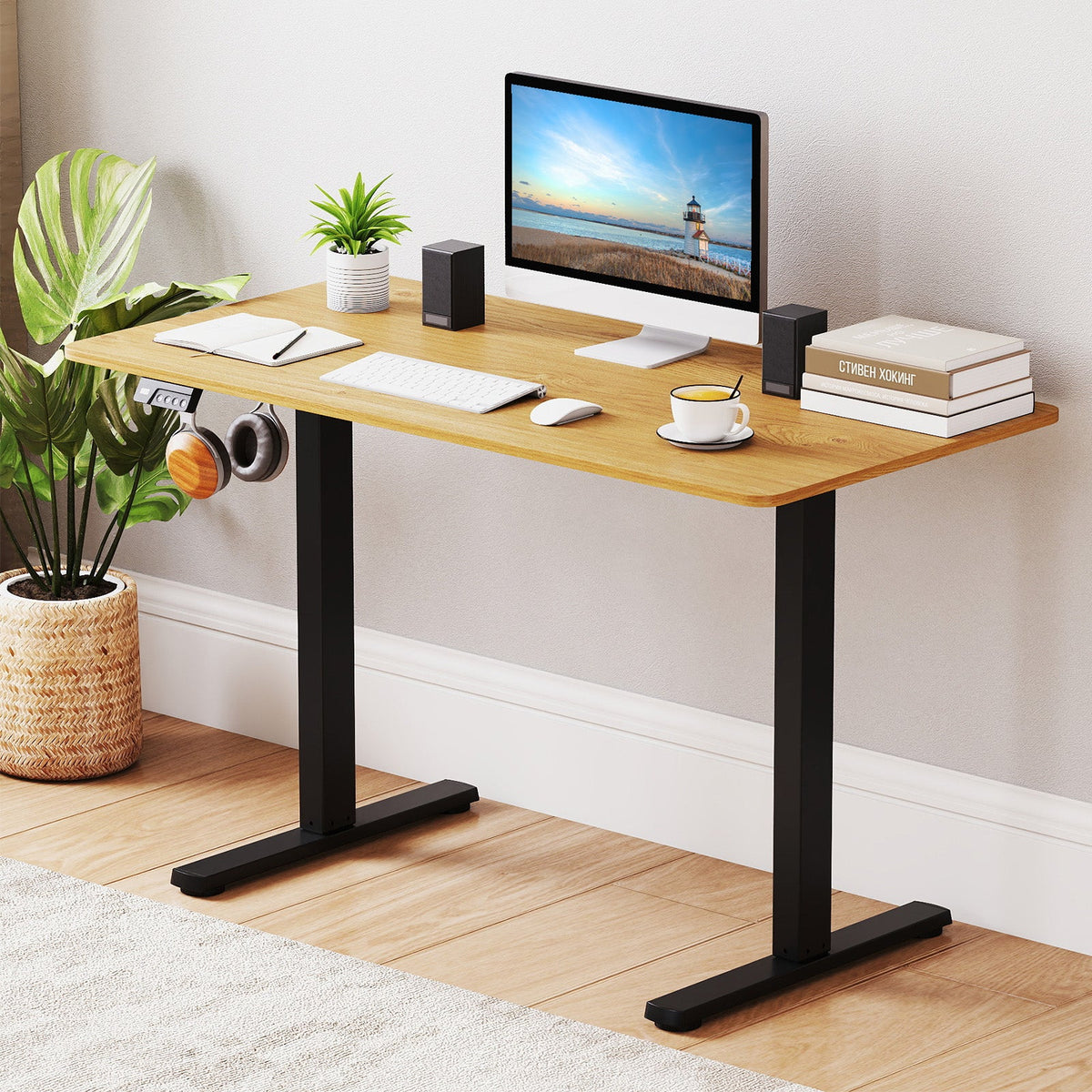 Electric standing desk frame by DirectDeals with height adjustability and LED display, designed for ergonomic computer work.